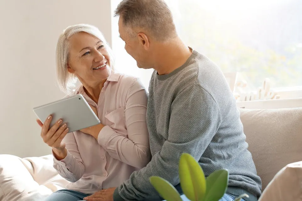 A smiling retired couple
